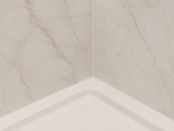 Close view of a finished shower wall panel seam